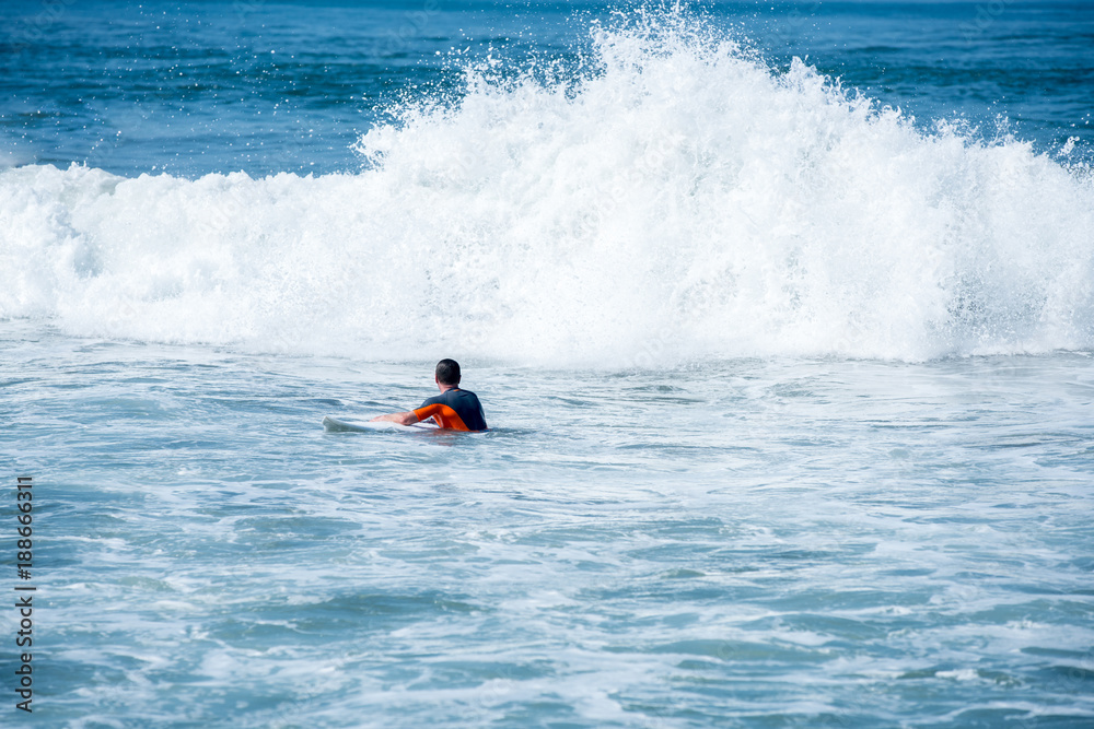 Surfing the waves of Indonesia beach Surfing the waves of Indonesia beach