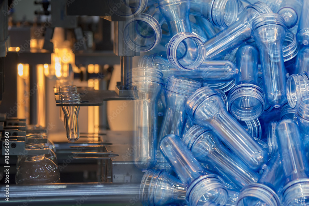 Abstract scene of blowing bottle process and raw material for plastic