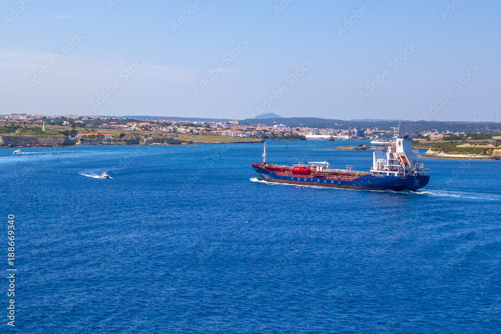 Great petrol tanker sailing the coast of Menorca, Spain