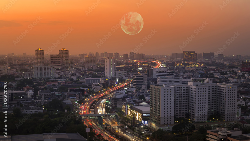 full moon over the city