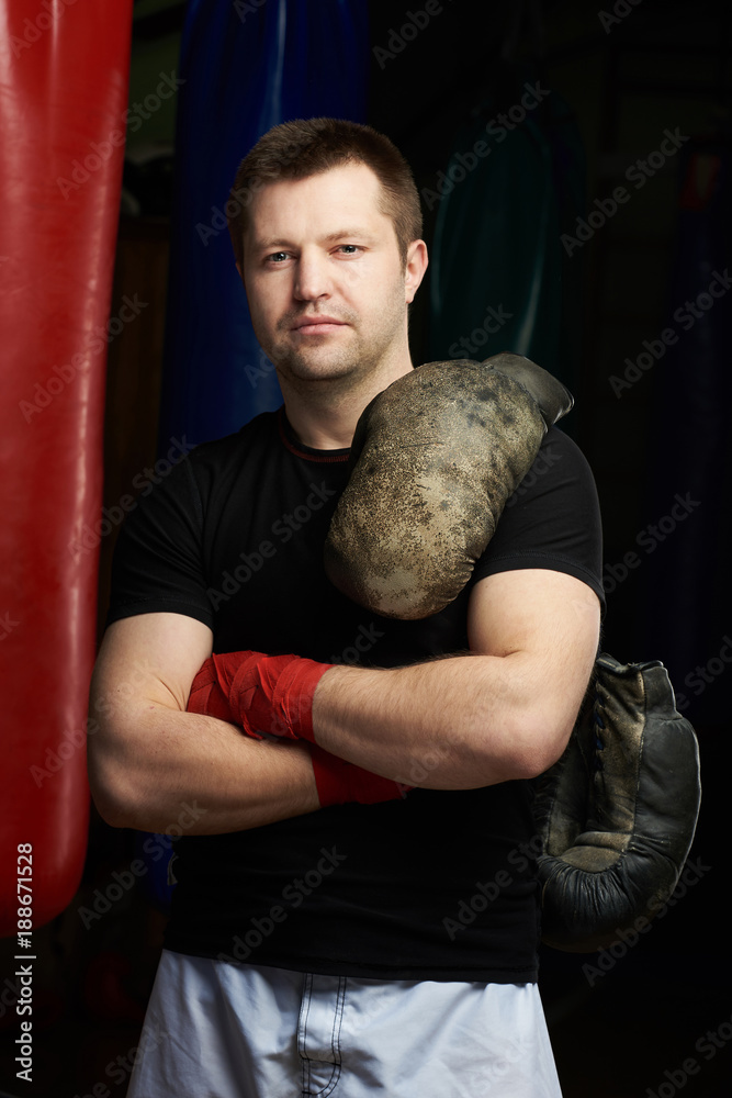 Boxing man with crossed arms