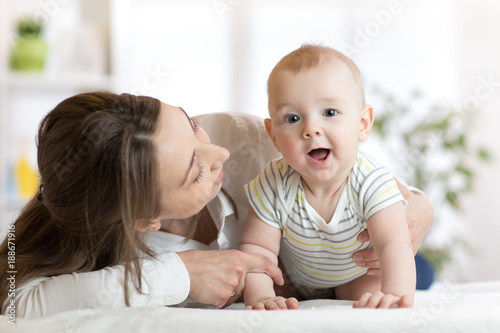 Happy child near to mom in ...