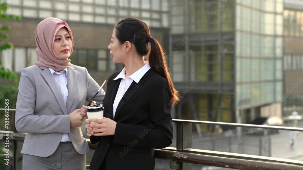 Asian business standing feeling relax talking Asian business standing feeling relax talking