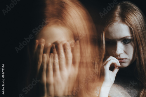 Tablou pe pânză Girl with split personality disorder