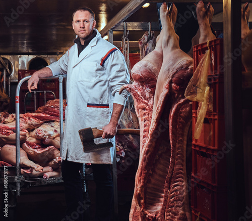 A butcher in a meat factory.