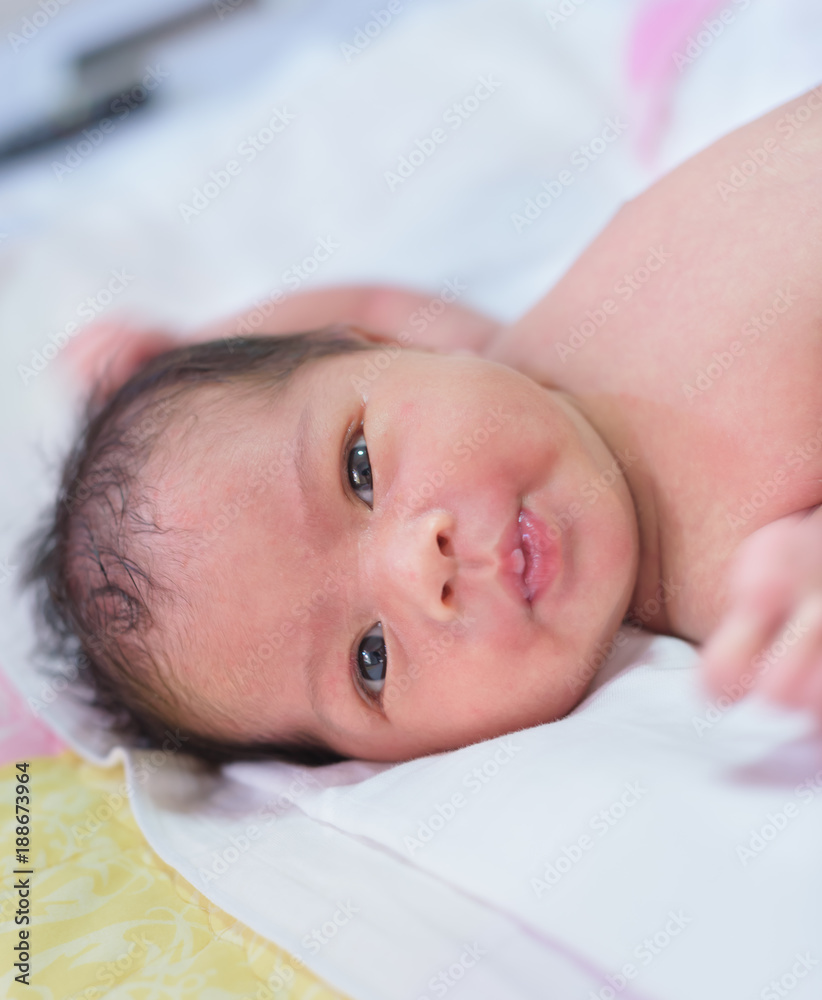 newborn baby girl feeling fresh after take a bath, selective focus, soft focus, newborn baby concept newborn baby girl feeling fresh after take a bath, selective focus, soft focus, newborn baby concept