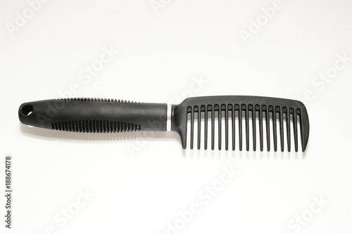 black comb on white background