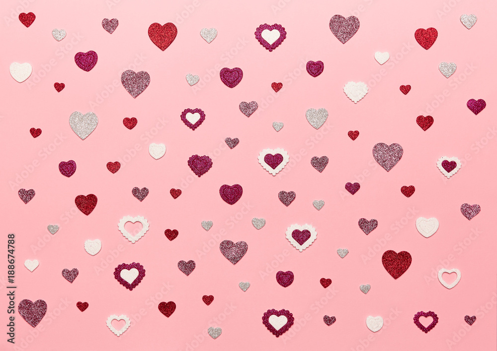 Valentine's Day Background. Red Hearts on a Pink background. Flat Lay. St.Valentine's Day Wallpaper. Love concept