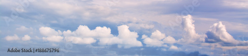Fototapeta Naklejka Na Ścianę i Meble -  White curly clouds in a blue sky. Sky background