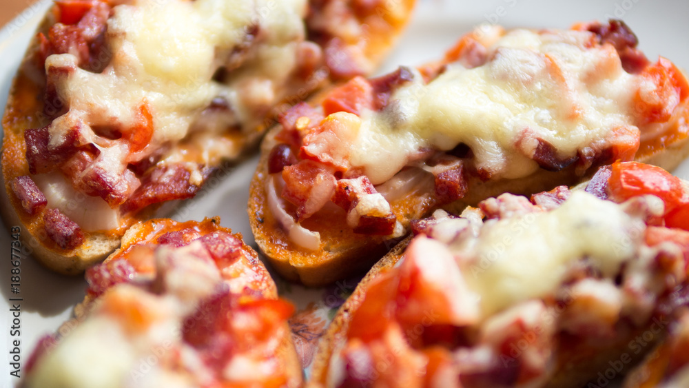 tasty homemade hot sandwiches with sausage, cheese and tomatoes tasty homemade hot sandwiches with sausage, cheese and tomatoes