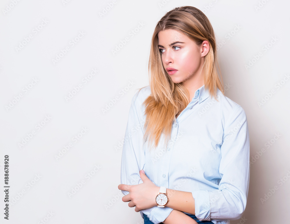 beautiful young woman in casual outfit wearing wrist watch beautiful young woman in casual outfit wearing wrist watch