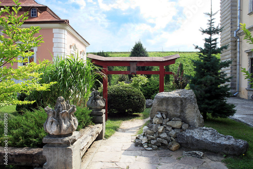 Chinese red arch near Zolochiv Castle, Lviv region, Ukraine