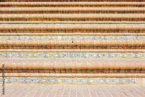 Stunning decorative tiling on the stairs of the Seville, Plaza de España Spain.