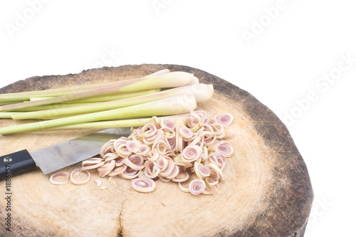 sliced lemongrass on wooden chopping block  isolated on white background.With clippin path