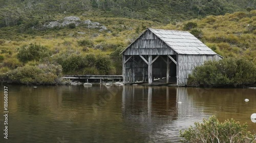 afternoon summer shot of the historic boat shed at dove lake in tasmania, australia photo