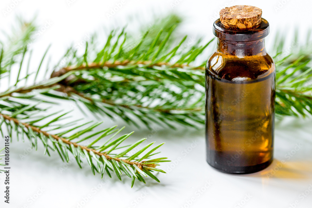aromatherapy with organic spruce oils in glass bottles on white aromatherapy with organic spruce oils in glass bottles on white