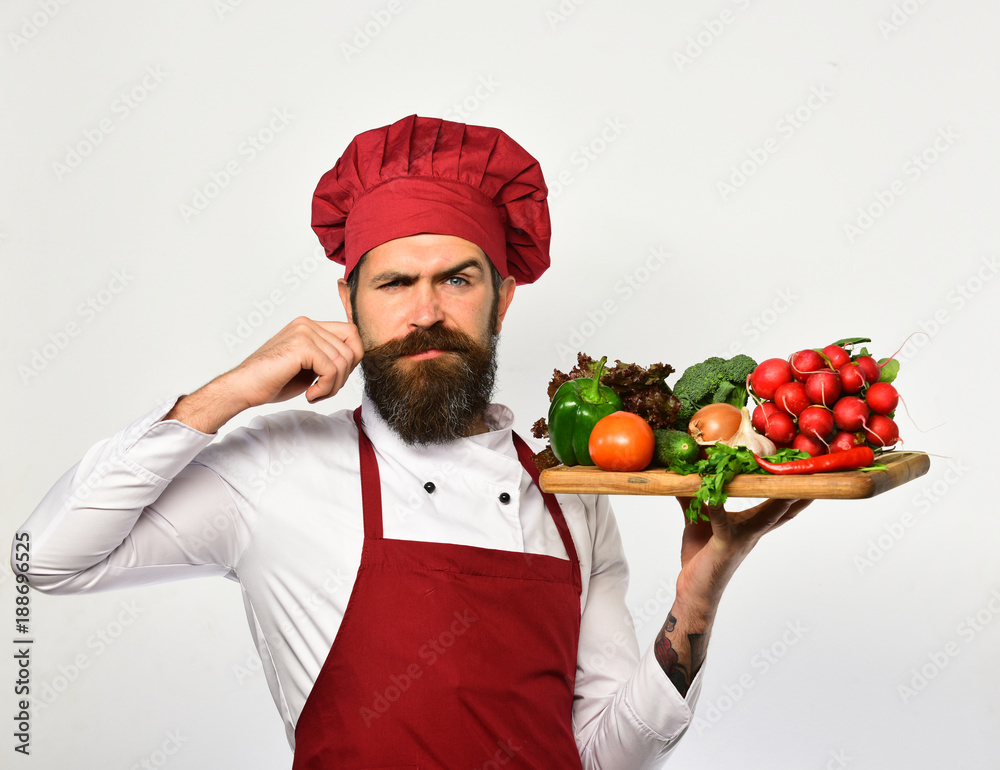 Healthy nutrition and cuisine concept. Man with beard Healthy nutrition and cuisine concept. Man with beard