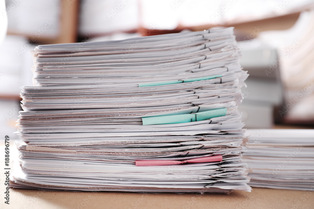 Stack of old paper documents on table in archive, closeup Stack of old paper documents on table in archive, closeup