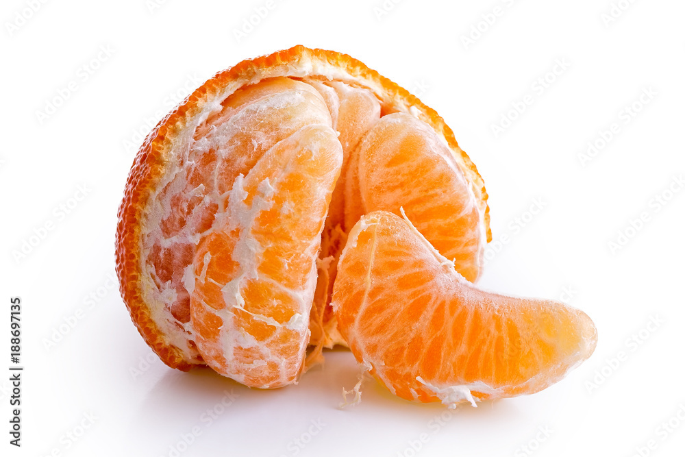 A half peeled mandarin split into segments isolated on white. A half peeled mandarin split into segments isolated on white.