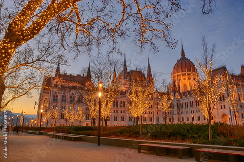 Parliament building, illuminated trees, Christmas Eve, Budapest photo