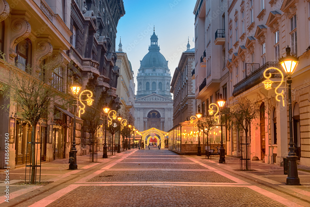 Zrínyi street in Budapest ending with St. Stephen's Basilica building
