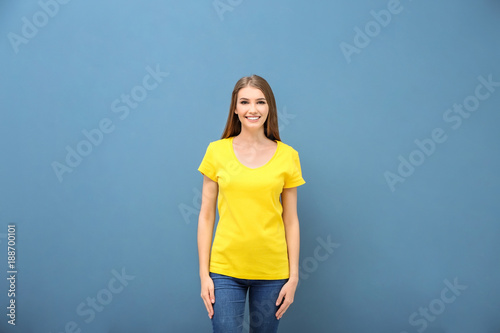 Young woman in yellow t-shi...