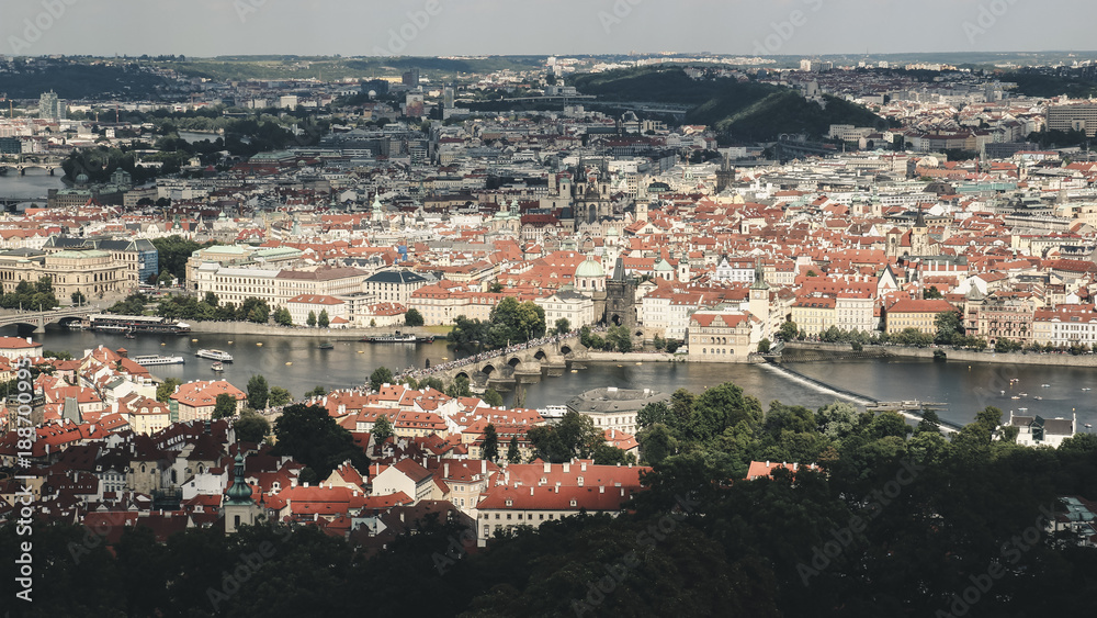 Panorama of Prague, the Vltava river and Charles Bridge. Photo in retro style
