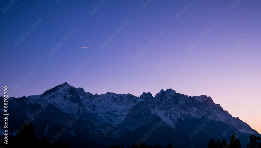 plane flying over a mountain during dusk - astounding sky plane flying over a mountain during dusk - astounding sky