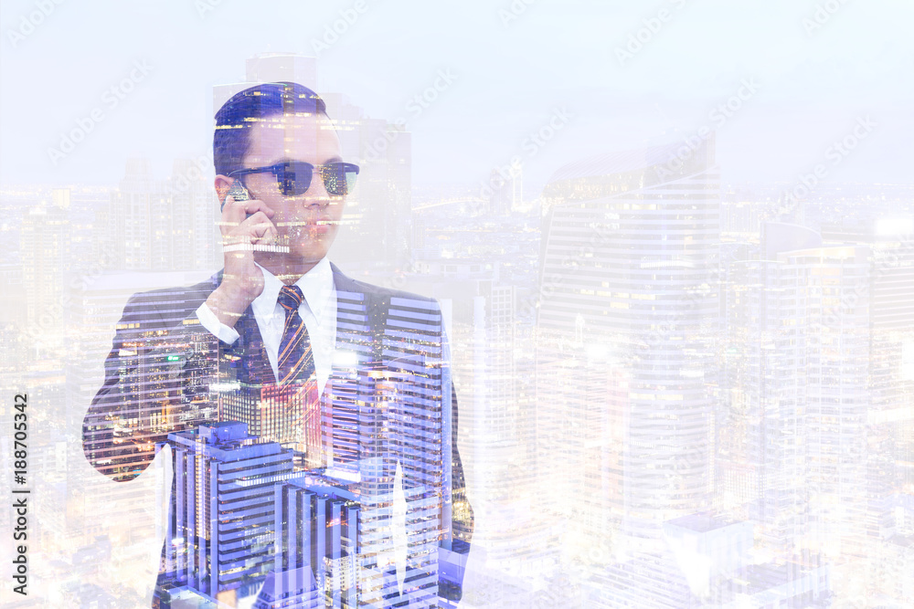 Male businessman and city and night light.
