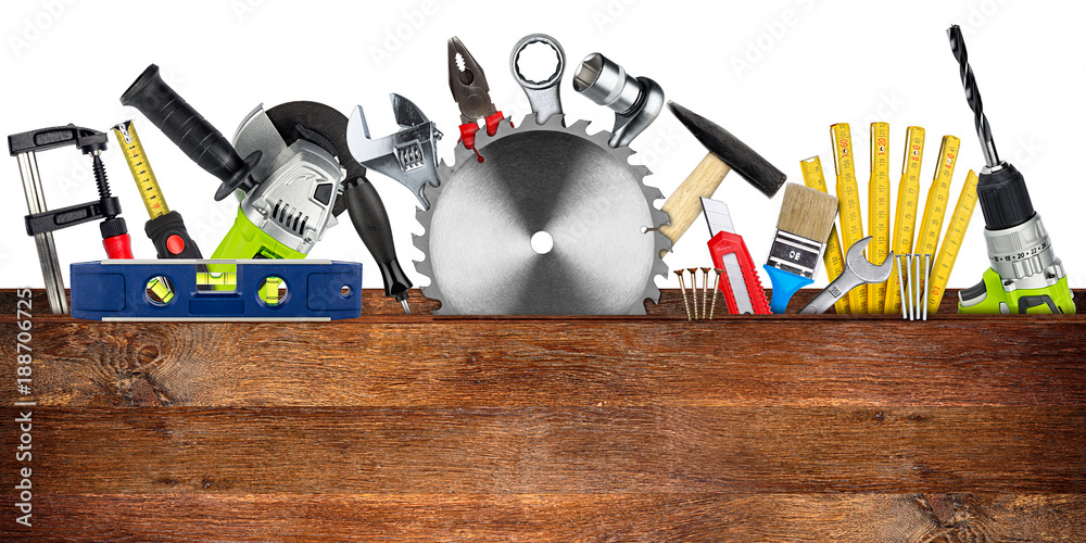 DIY tools collage concept behind wooden plank with copy space and circular saw blade isolated on white wide panorama background