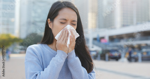 Woman runny nose at outdoor