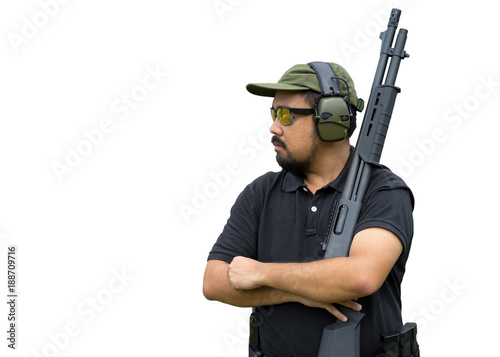 View of a man with a shotgun isolated on white background.