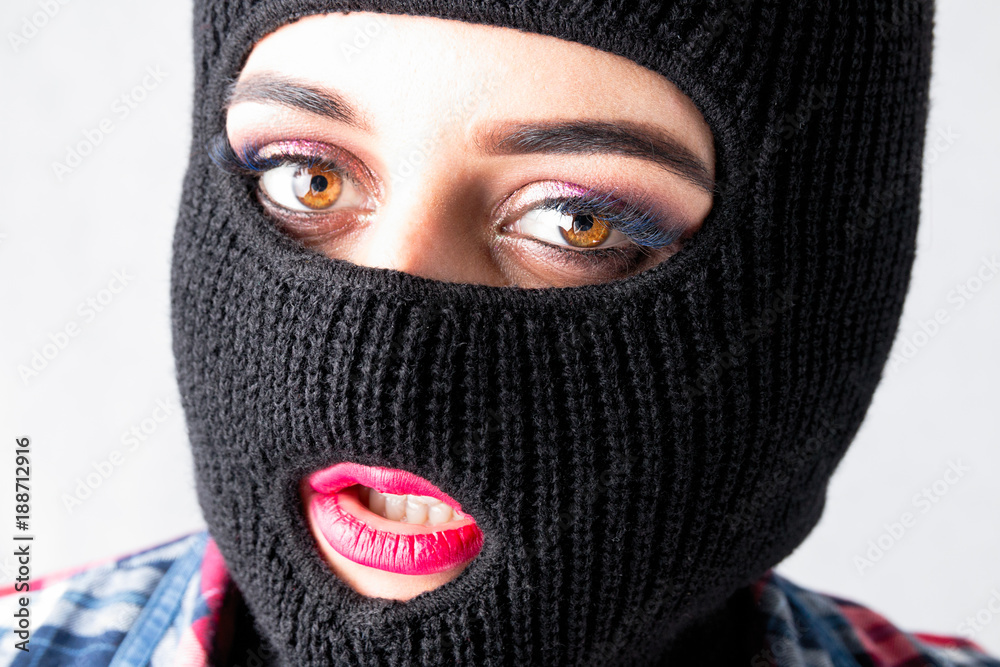 Foto Stock sexy bandit girl, fat model in balaclava, Woman Plus Size in  shirt posing topless on white background with brown eyes. XXL female in  black mask with lips tongue | Adobe