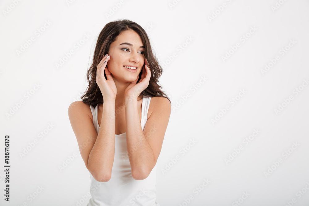 Portrait of a smiling girl dressed in tank-top Portrait of a smiling girl dressed in tank-top