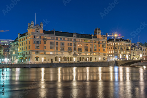 Rosenbad i Stockolm på natten med julbelysning på kajen photo