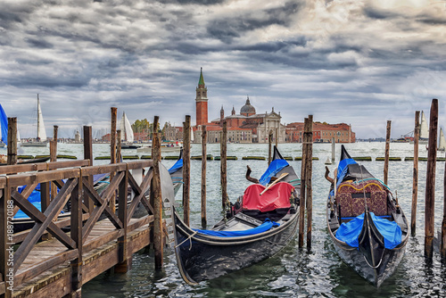 Gondals moored at waterfront, Riva degli Schiavoni, with view to San Giorgio Maggiore, Venice, UNESCO World Heritage Site, Veneto, Italy, Europe