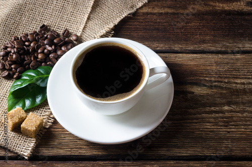 Cup of coffee on wooden rustic table