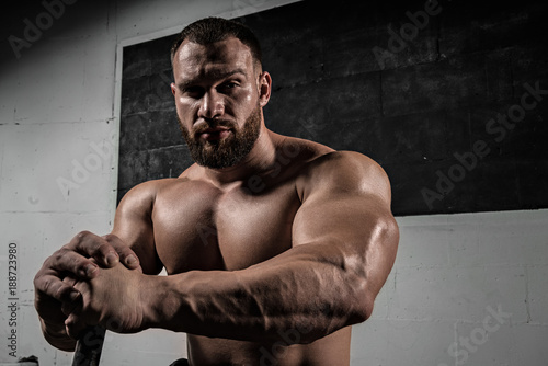 Portrait of a athleltic muscular bearded man photo