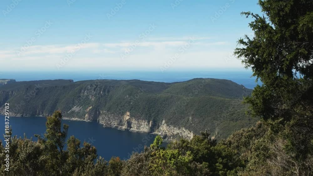 panning shot of cape pillar from cape hauy on the three capes track in tasmania, australia panning shot of cape pillar from cape hauy on the three capes track in tasmania, australia