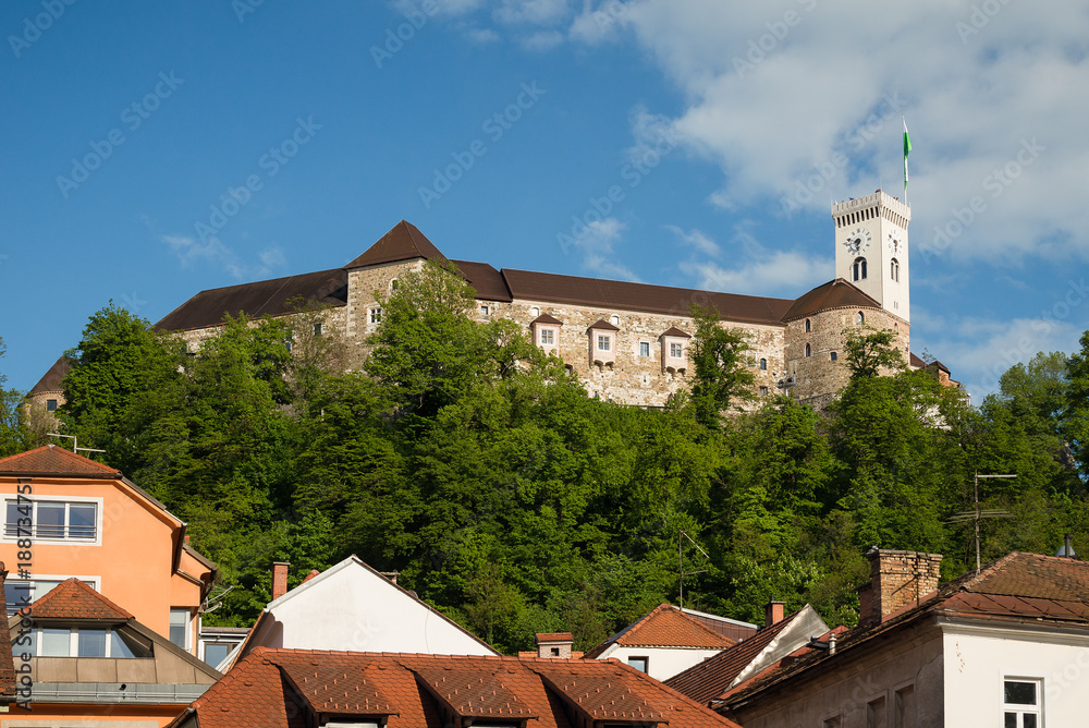 Ljubljana castle and old town apartments roof tops in Ljubljana, Slovenia