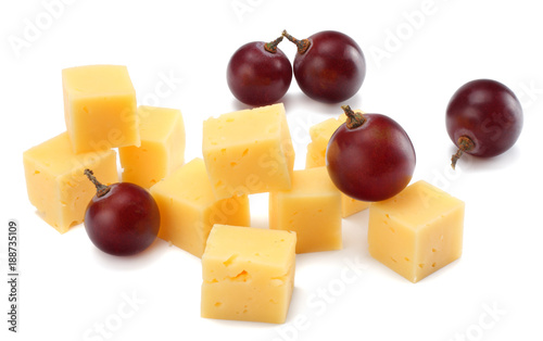 piece of cheese with grapes isolated on white background