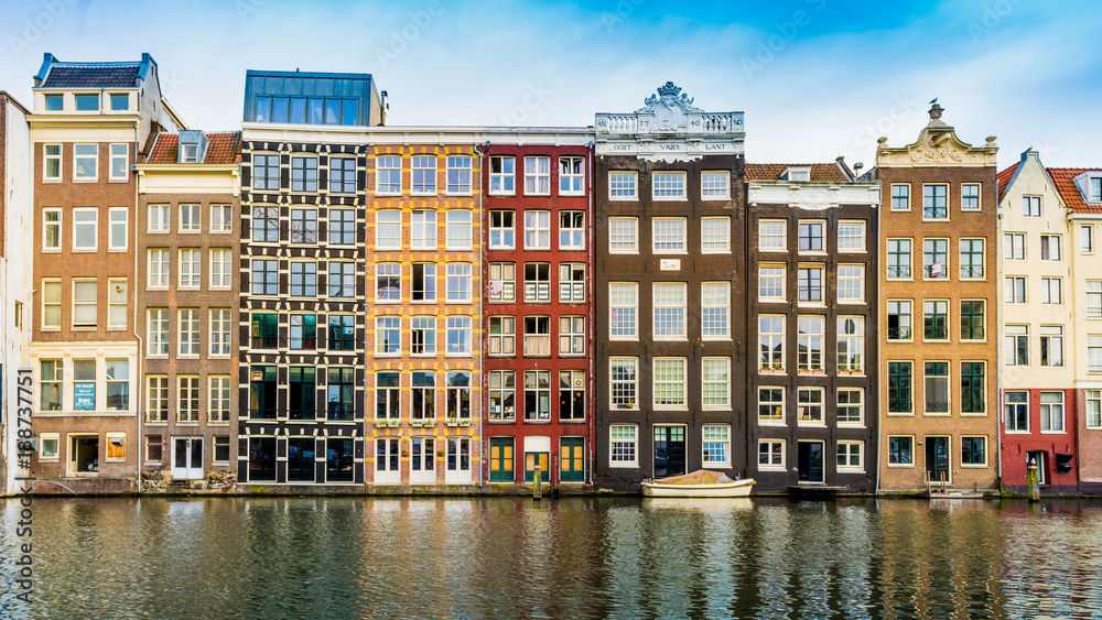 Canal houses of Amsterdam, Netherlands. Traditional old buildings in Amsterdam