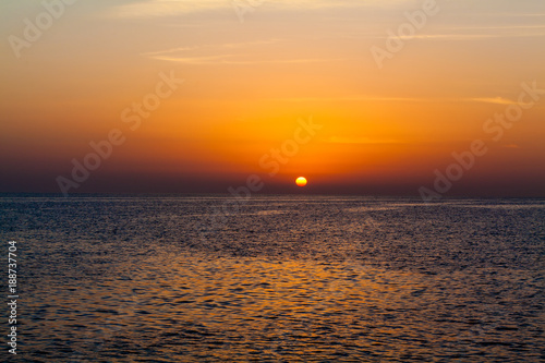 Beautiful sunset above the sea. sunset sky background