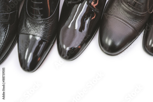 Men shoes in a row eith copy space