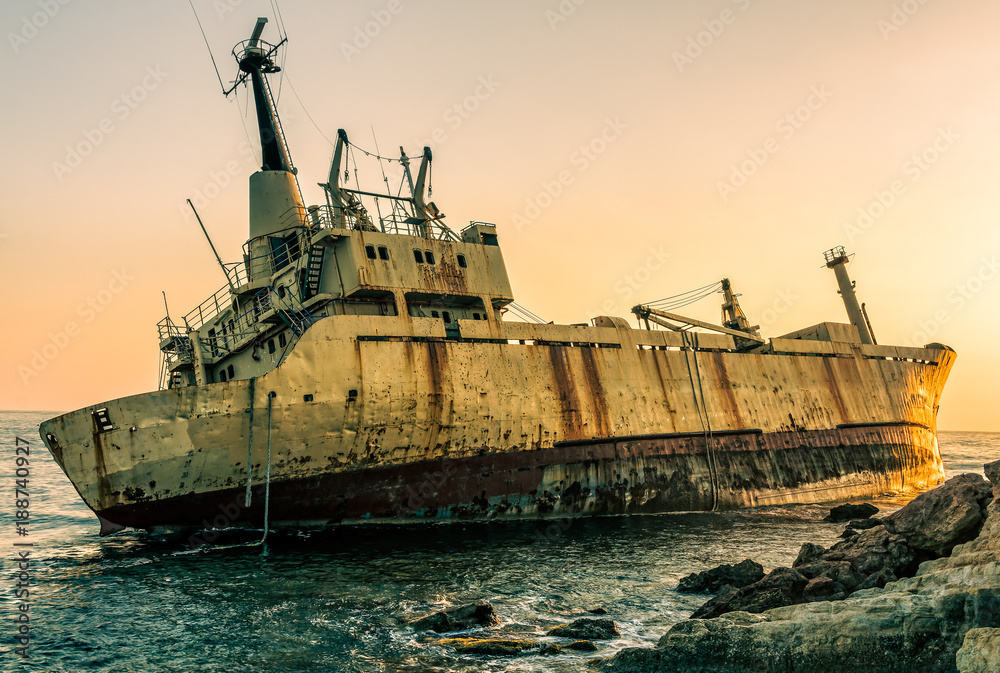 Shipwreck at rocky shore HDR shot