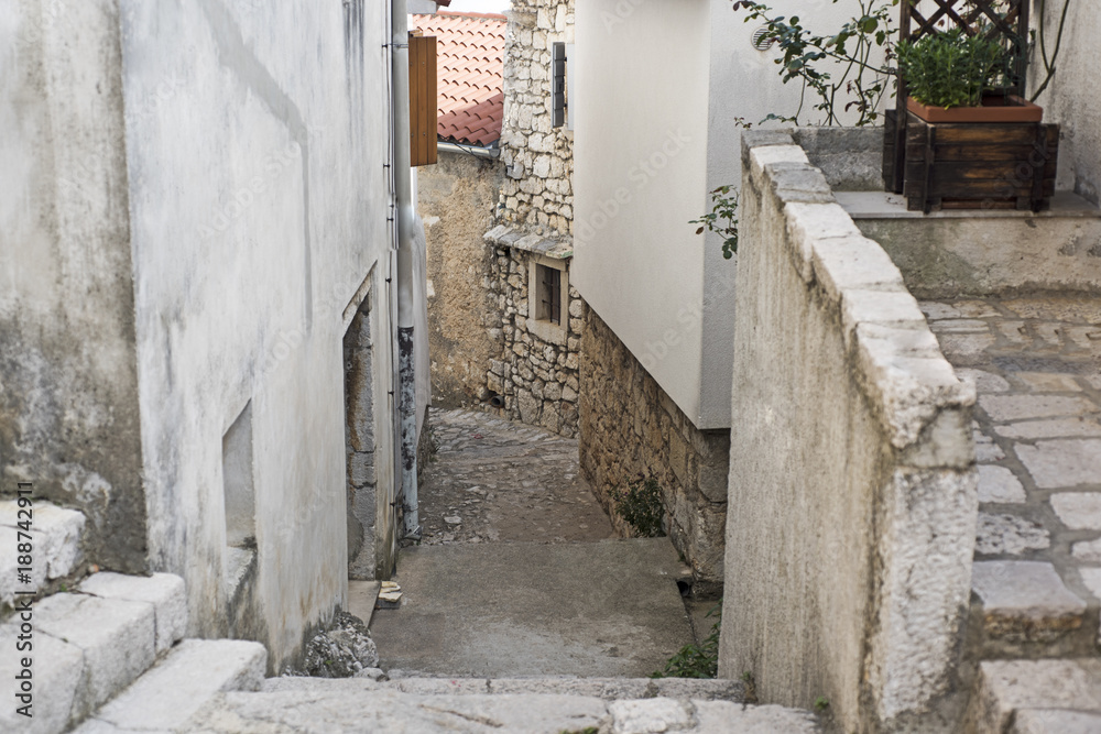 Narrow street in the center of the Croatian city.