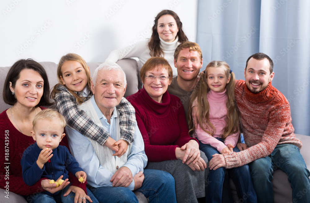 Fototapeta premium Positive family making numerous photos