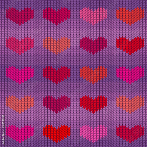 Knitted woolen seamless pattern with pink hearts on a violet background. Valentine's Day