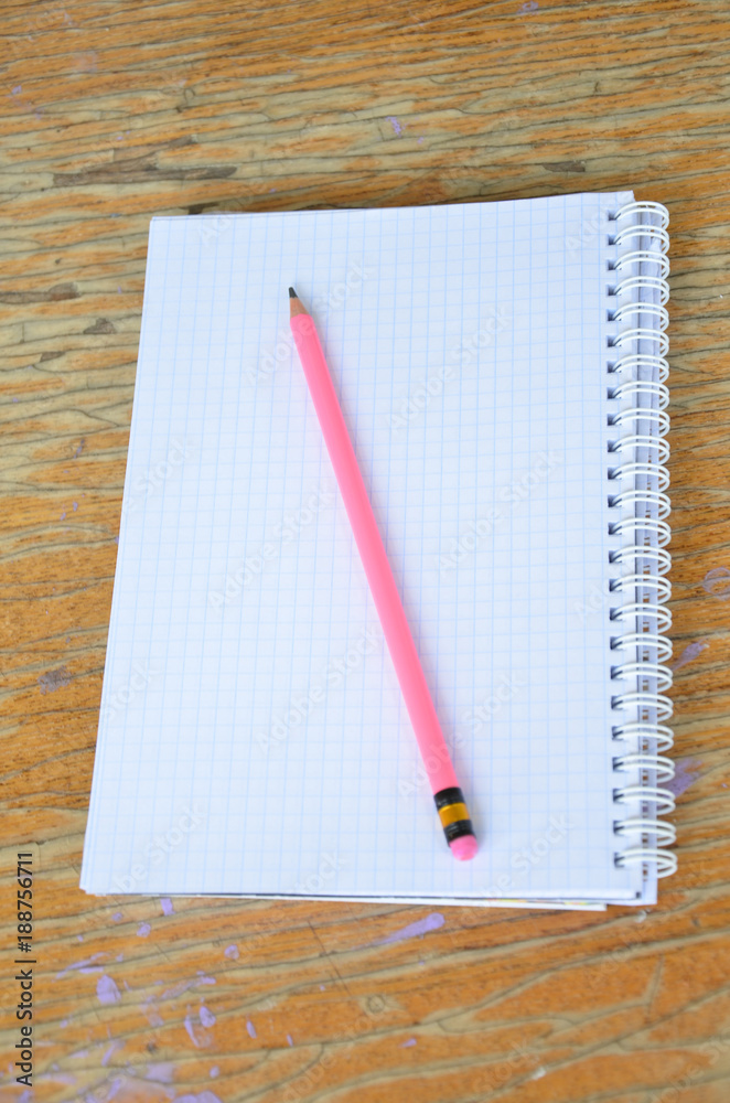 Adhesive note with pink paperclip and pink pencil. blogger cocept Adhesive note with pink paperclip and pink pencil. blogger cocept