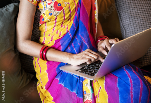 Indian woman is using computer laptop photo